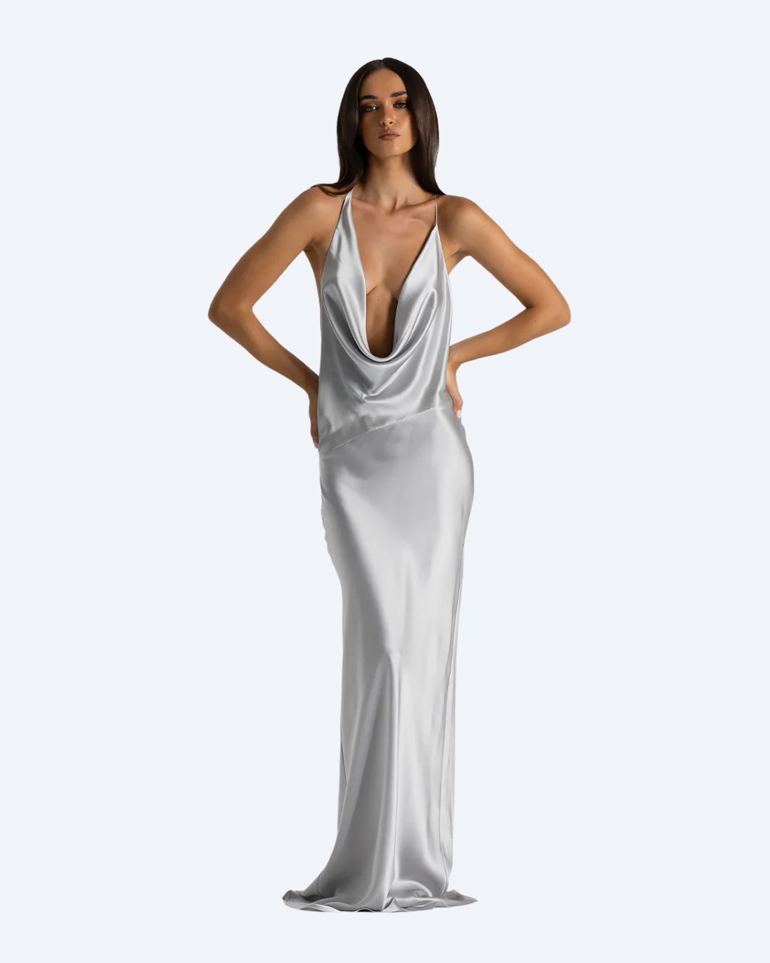 Woman wearing the Gabi Gown by Natalie Rolt, a silver satin front view dress on a white background