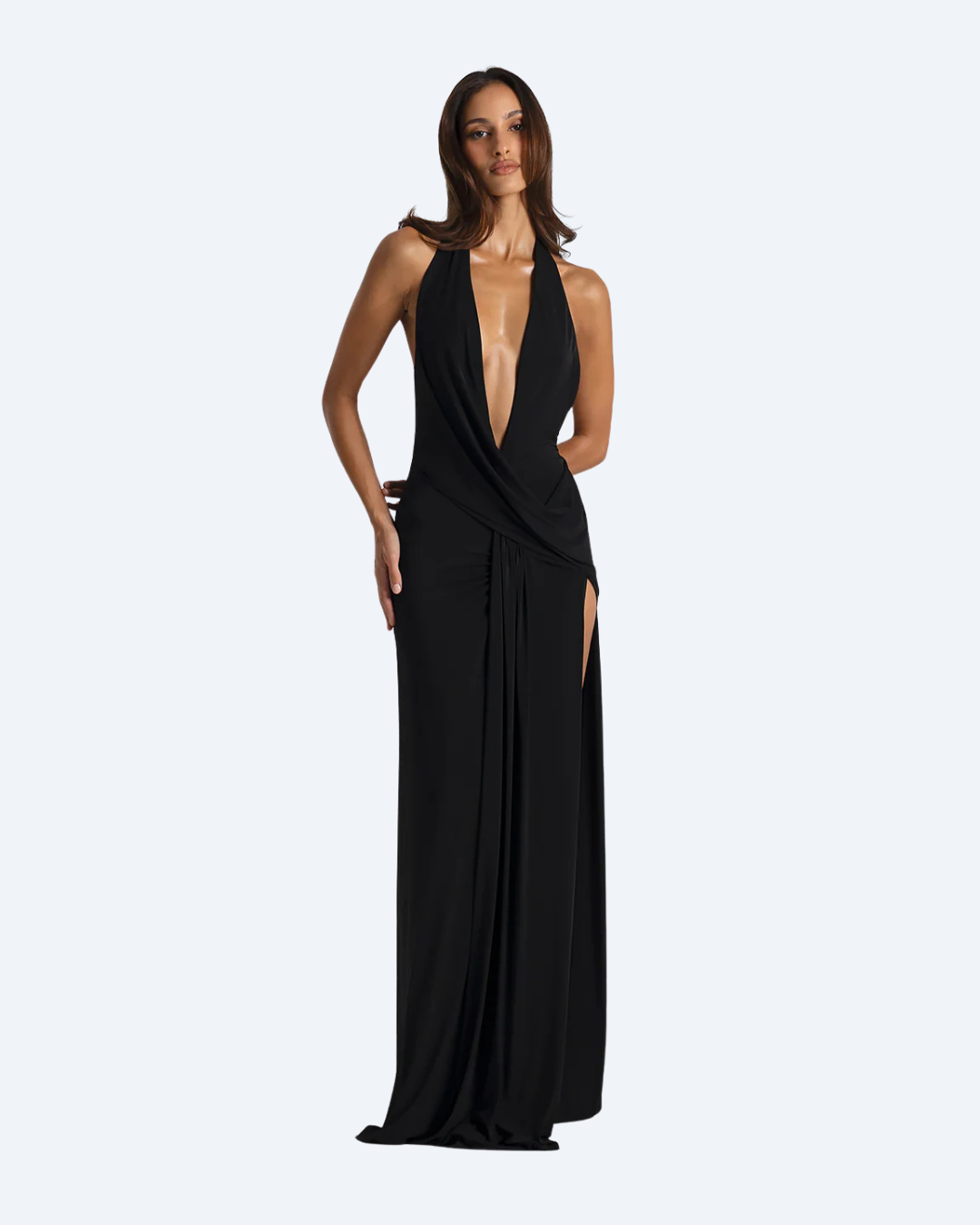 Woman wearing the Winona Gown by Natalie Rolt, a black evening gown with sheer panels front-view dress for hire by Dresscode on a white background