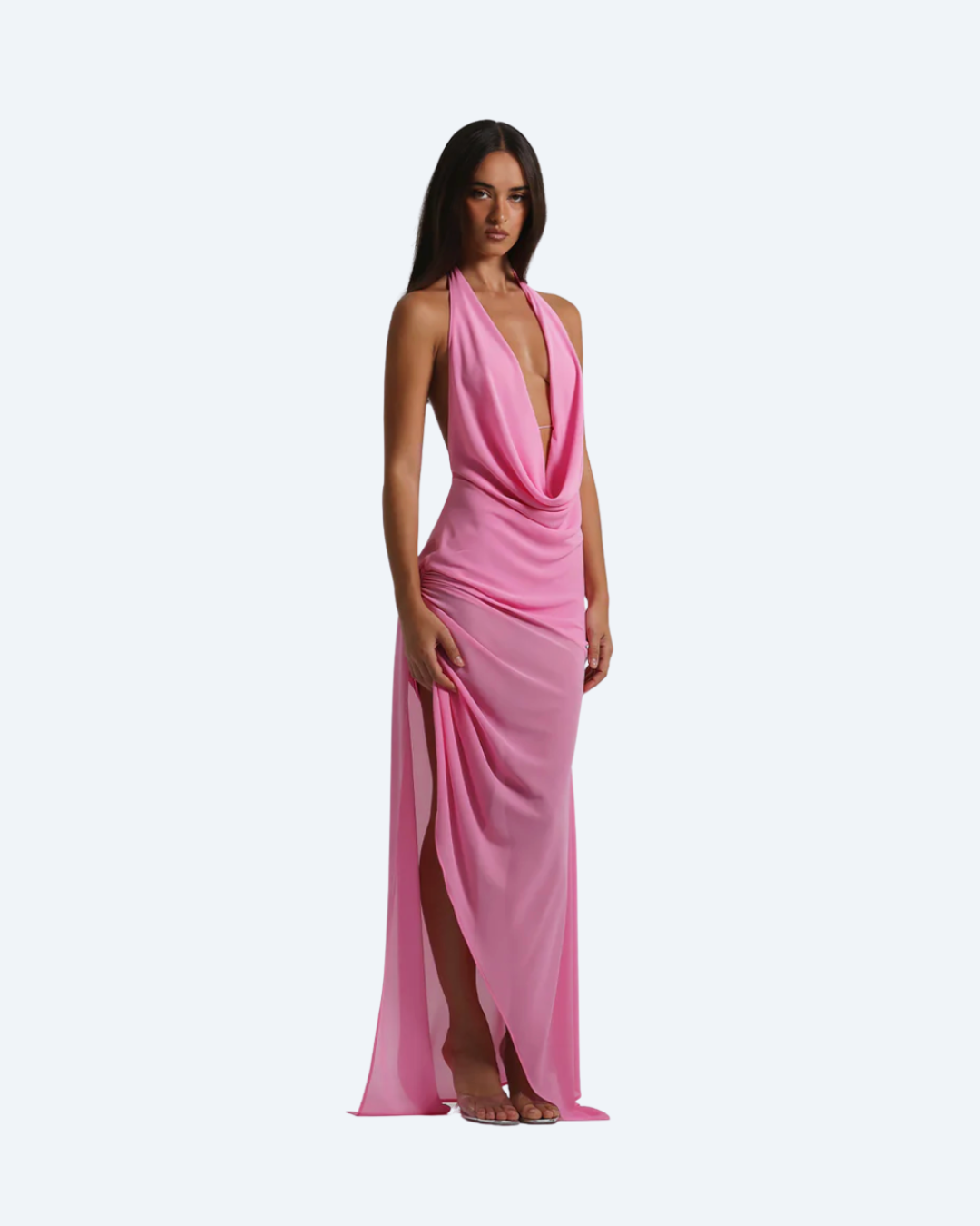 Woman wearing a pink evening gown on a white background
